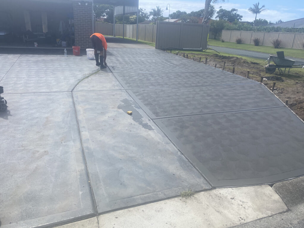 man checking on the floor cement