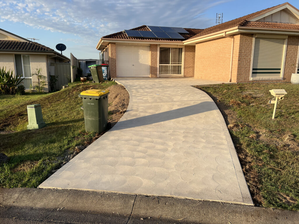 white cemented pathway during sunset