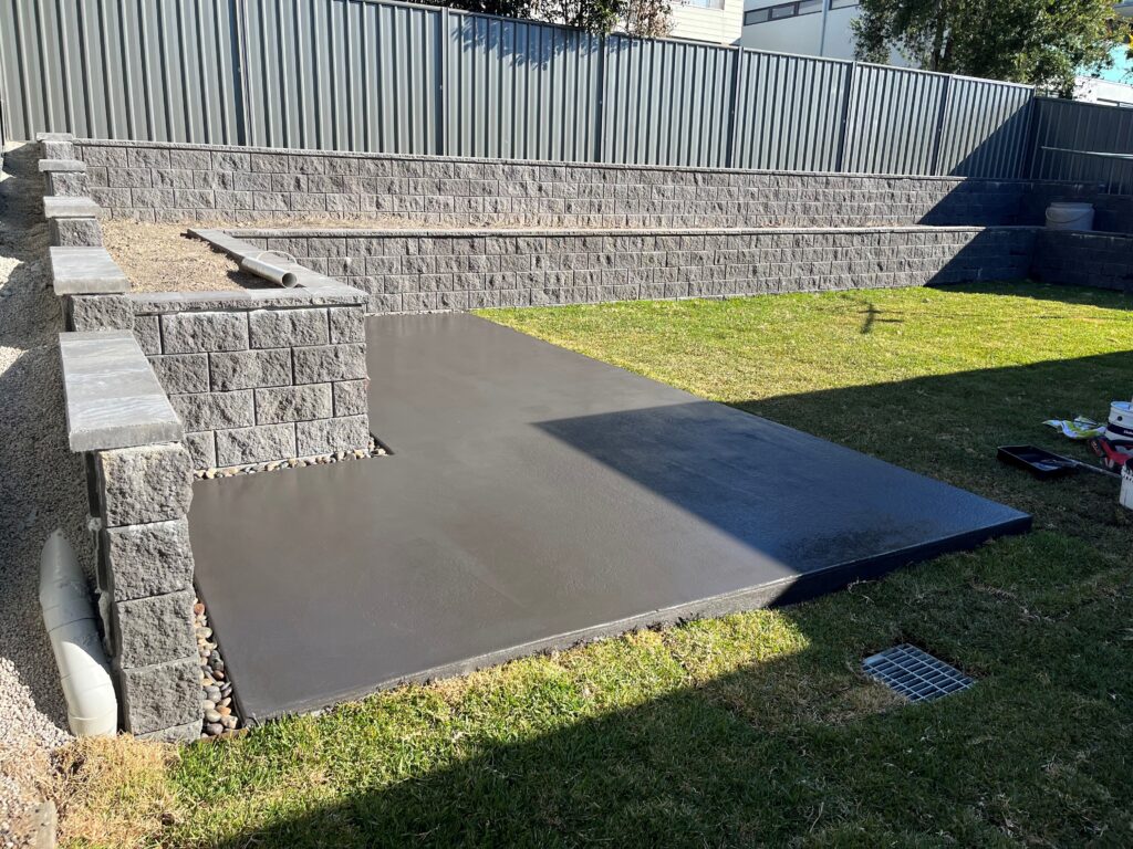 cemented side planters in a small garden